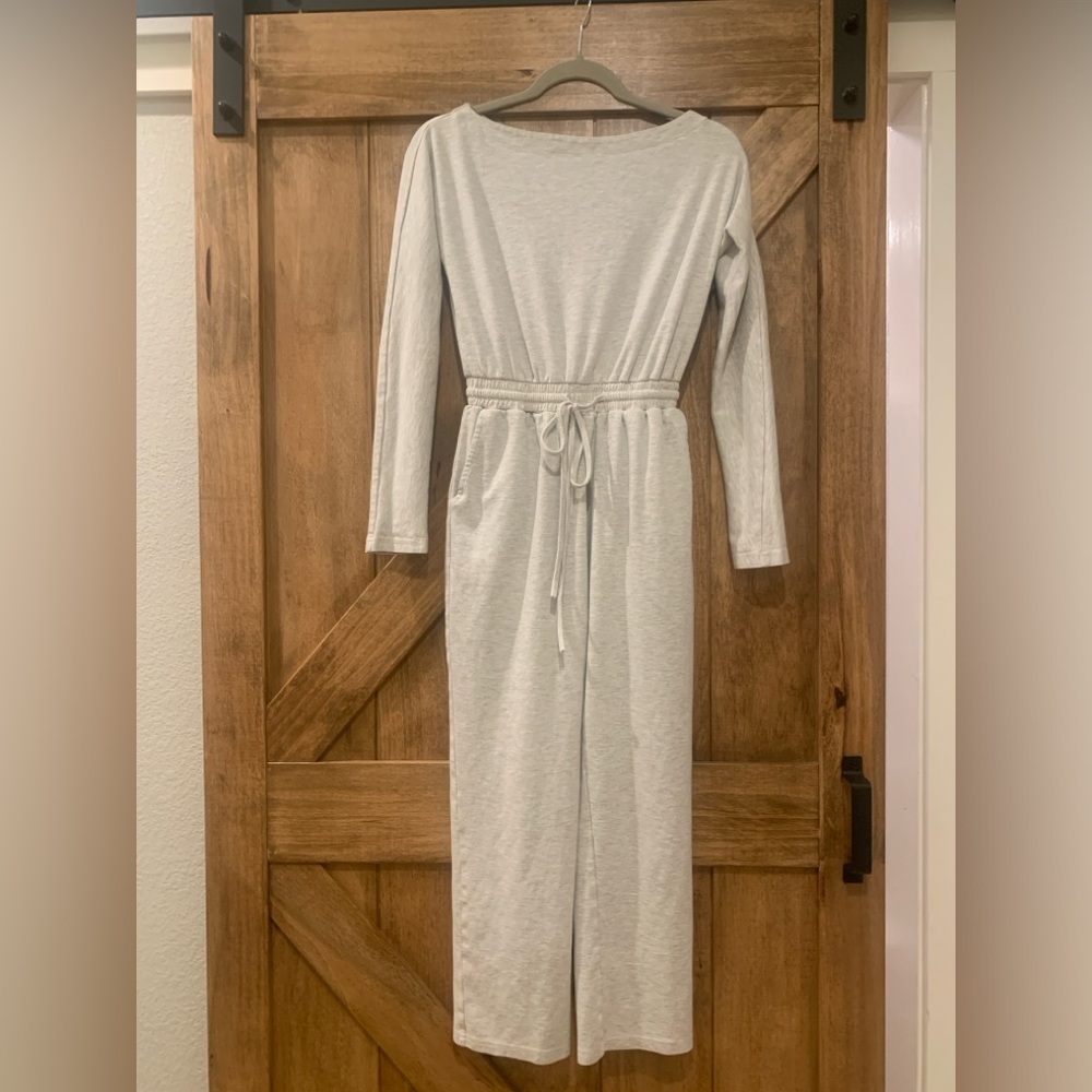 Pink Lily comfy romper. Size XS. Color is a light heather grey. 30” inseam.